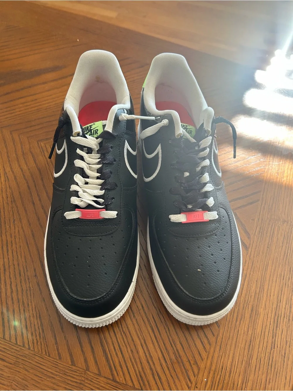 Nike Black & White Low-Top Sneakers with Pink Accent